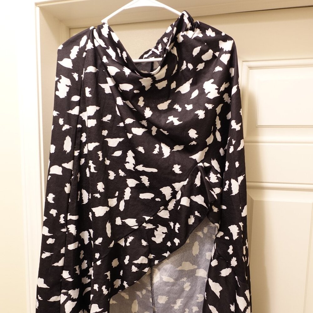 Woman's XL 100% polyester skirt, hi-low hemline